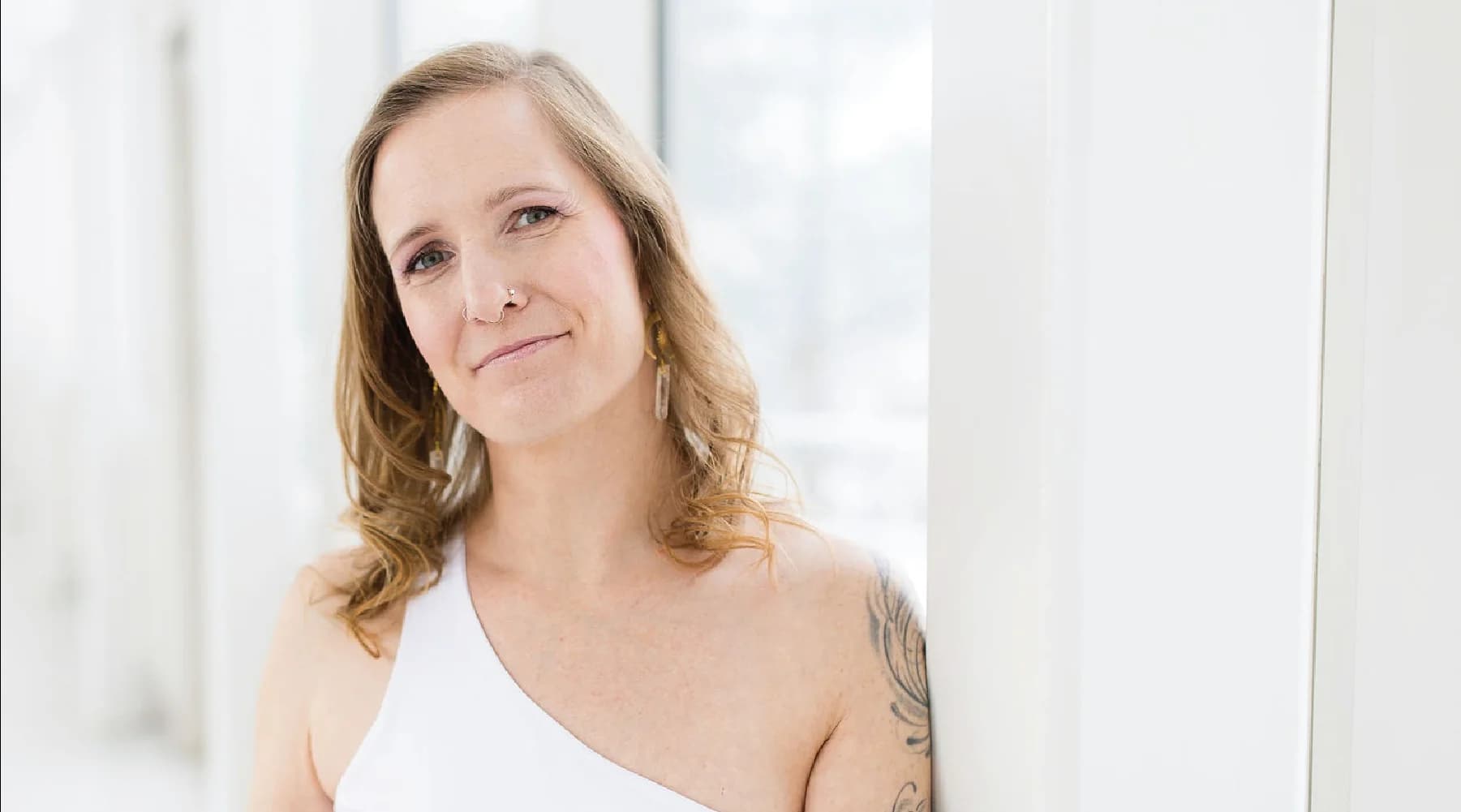 Black-and-white portrait of Alecia Iwanchuk, Studio Owner behind intentions-yoga.ca