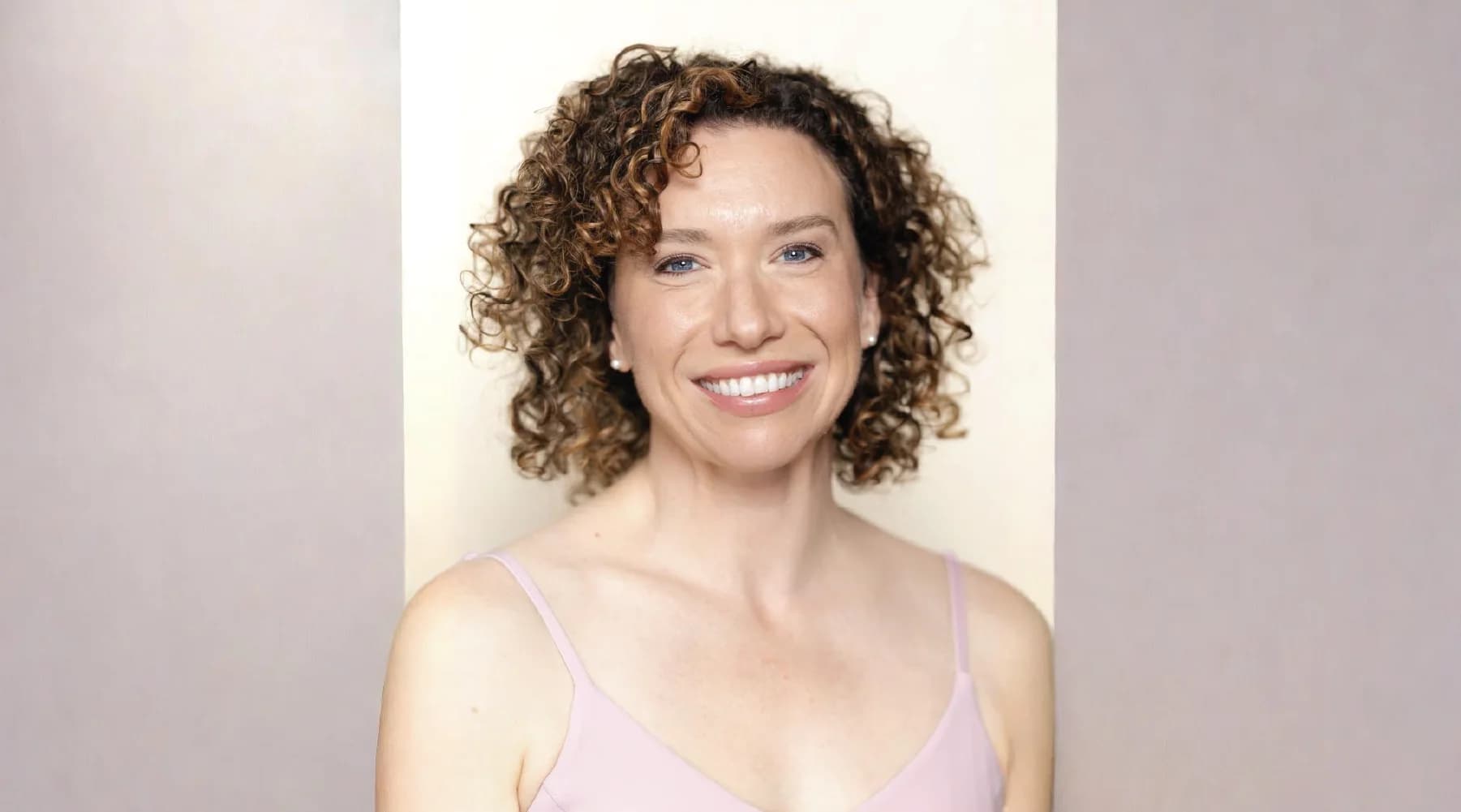 Black-and-white portrait of Becca Barnard, Yoga Teacher behind theyogapatch.com