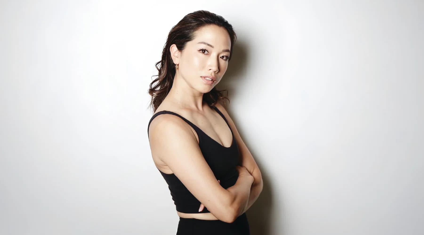 Black-and-white portrait of Juri Ko, Studio Owners behind IGNITE YOGA and VSSL UNION